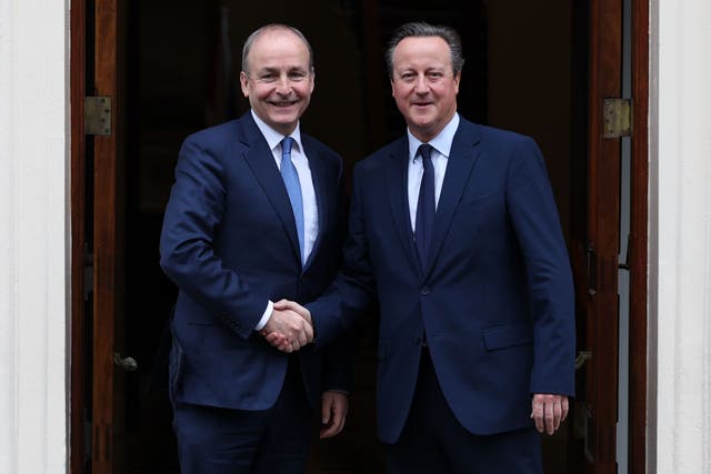 Foreign Secretary Lord David Cameron greets Irish Tanaiste Michael Martin at 1 Carlton Gardens in central London (Adrian Dennis/PA)