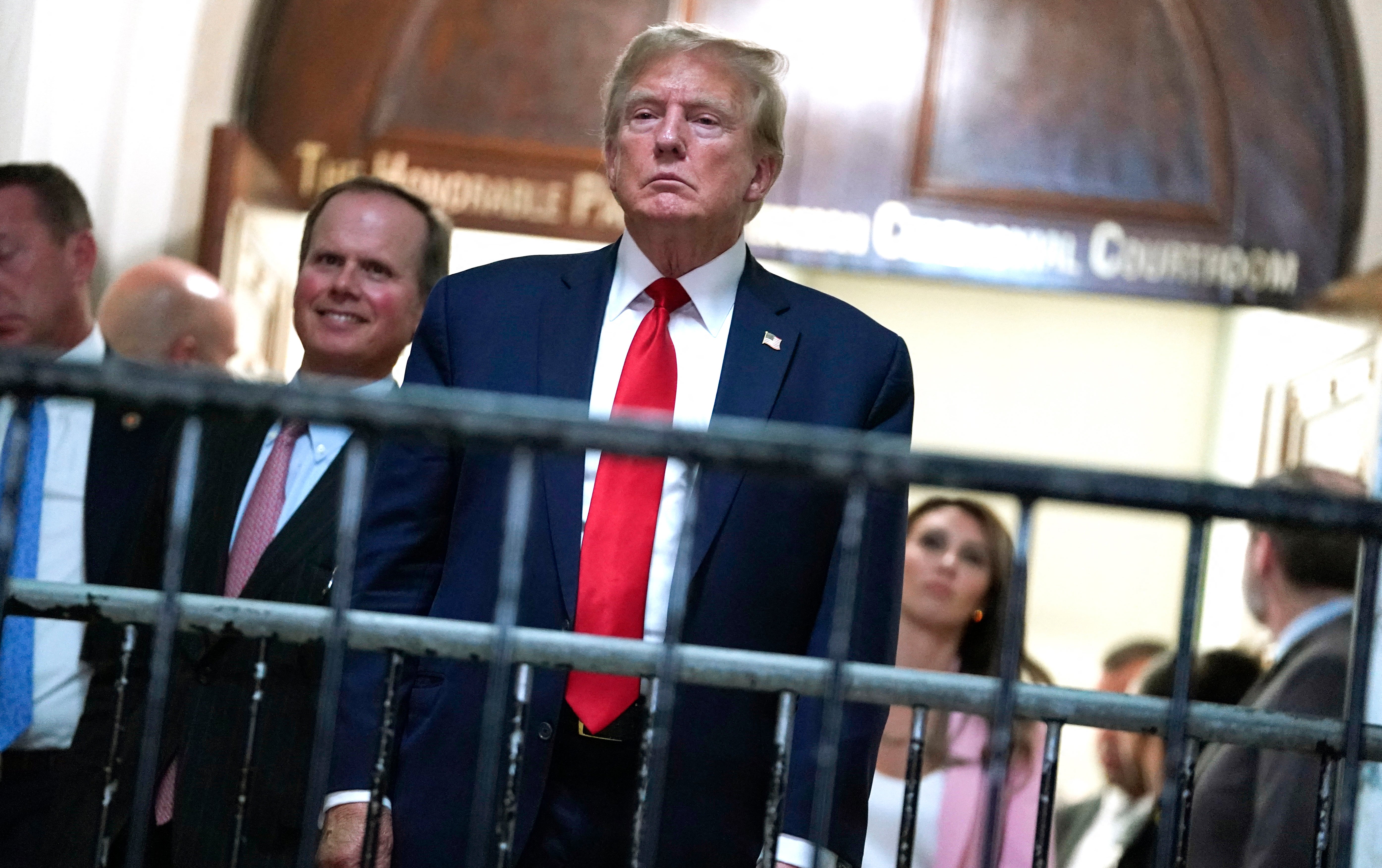 Donald Trump outside a New York courtroom on 15 February