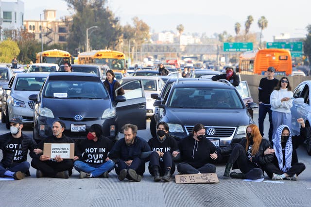 <p>Dozens of Jewish protesters block the 110 Freeway in LA as they call for Gaza ceasefire</p>