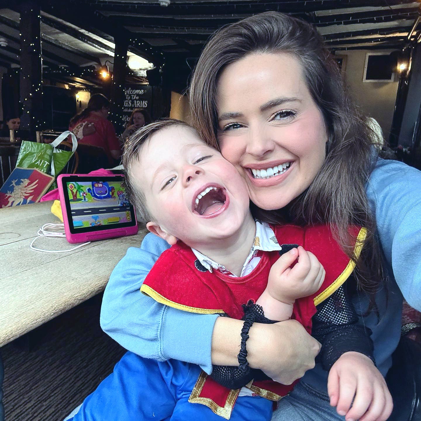 Ellie Thompson with her son Billy Thompson who has been left "spellbound" by a message of support he received from Queen guitarist Sir Brian May