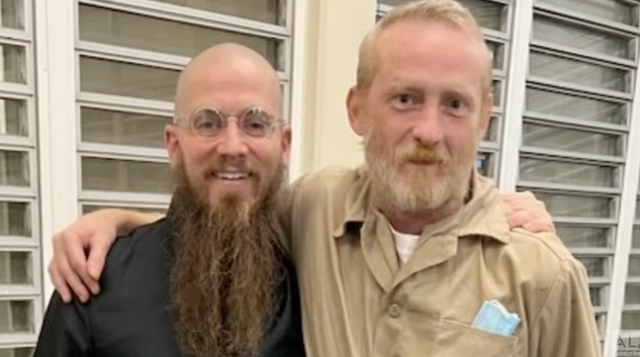 <p>Reverend Jeff Hood, left, attended the execution of Alabama death row prisoner Casey McWhorter in November</p>
