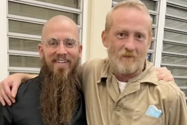 <p>Reverend Jeff Hood, left, attended the execution of Alabama death row prisoner Casey McWhorter in November</p>