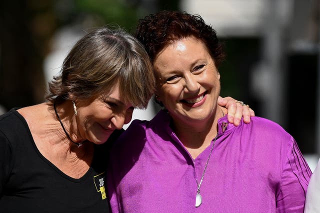 <p>Kathleen Folbigg, right, is embraced by friend Tracy Chapman outside the New South Wales Court of Criminal Appeal in Sydney, Australia, Thursday, 14 December 2023</p>
