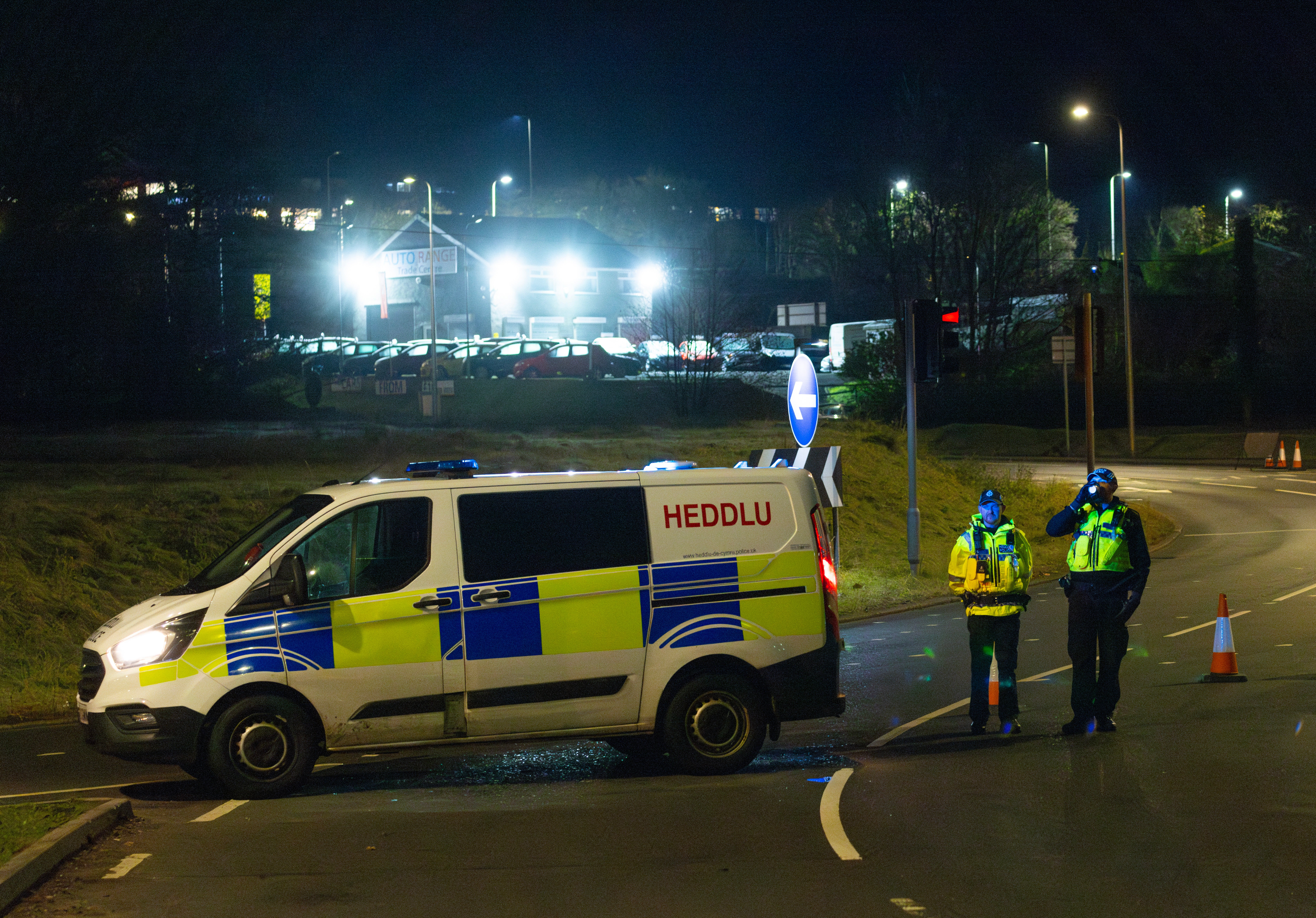 Police close roads near a fire at the Treforest Industrial Estate in Pontypridd, Wales, Britain, 14 December 2023