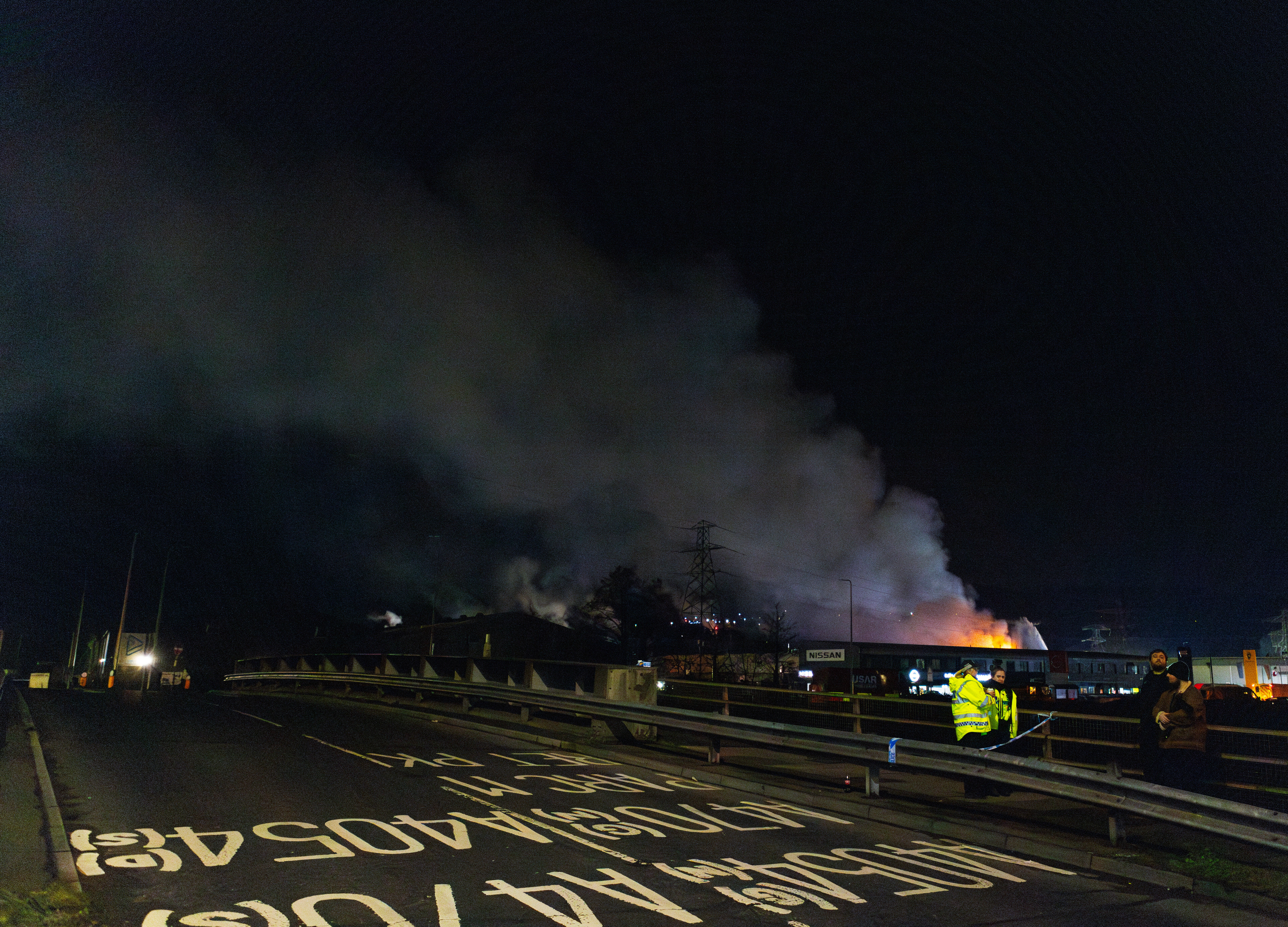 A large plume of smoke rises from a fire at the Treforest Industrial Estate in Pontypridd, Wales, Britain, 14 December 2023