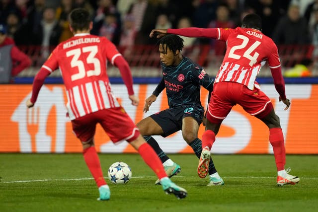 Micah Hamilton (centre) made a memorable debut for Manchester City at Red Star Belgrade (Darko Vojinovic/AP Photo)