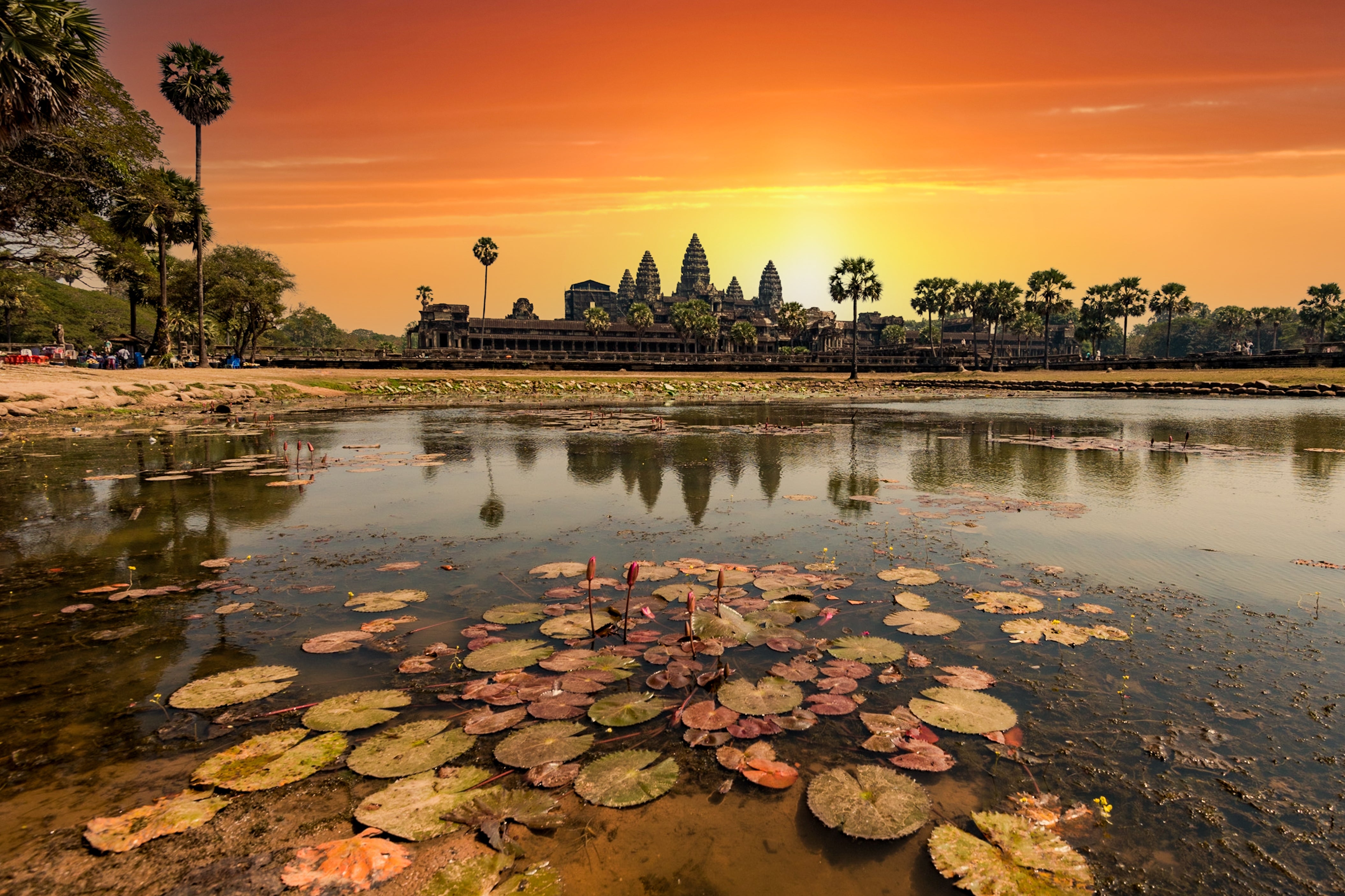 Nothing compares to a sunset boat ride on the stillness of the lake, with Angkor Wat illuminated by the fading light.