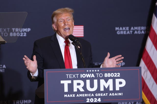 <p>Donald Trump speaks during a campaign event at the Hyatt Hotel in Coralville, Iowa, on 13 December 2023</p>