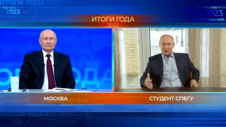 Double cross: Putin takes a question from an AI-generated lookalike, billed as a ‘resident of St Petersburg’