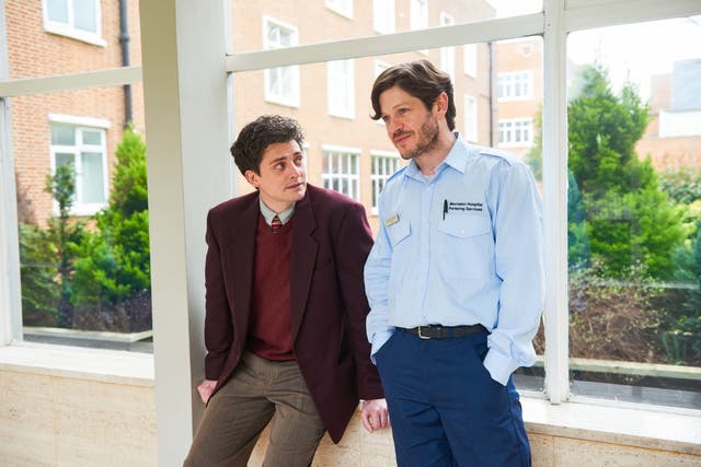 <p>Aneurin Barnard’s young doctor and Iwan Rheon as a trial participant in ‘Men Up’</p>