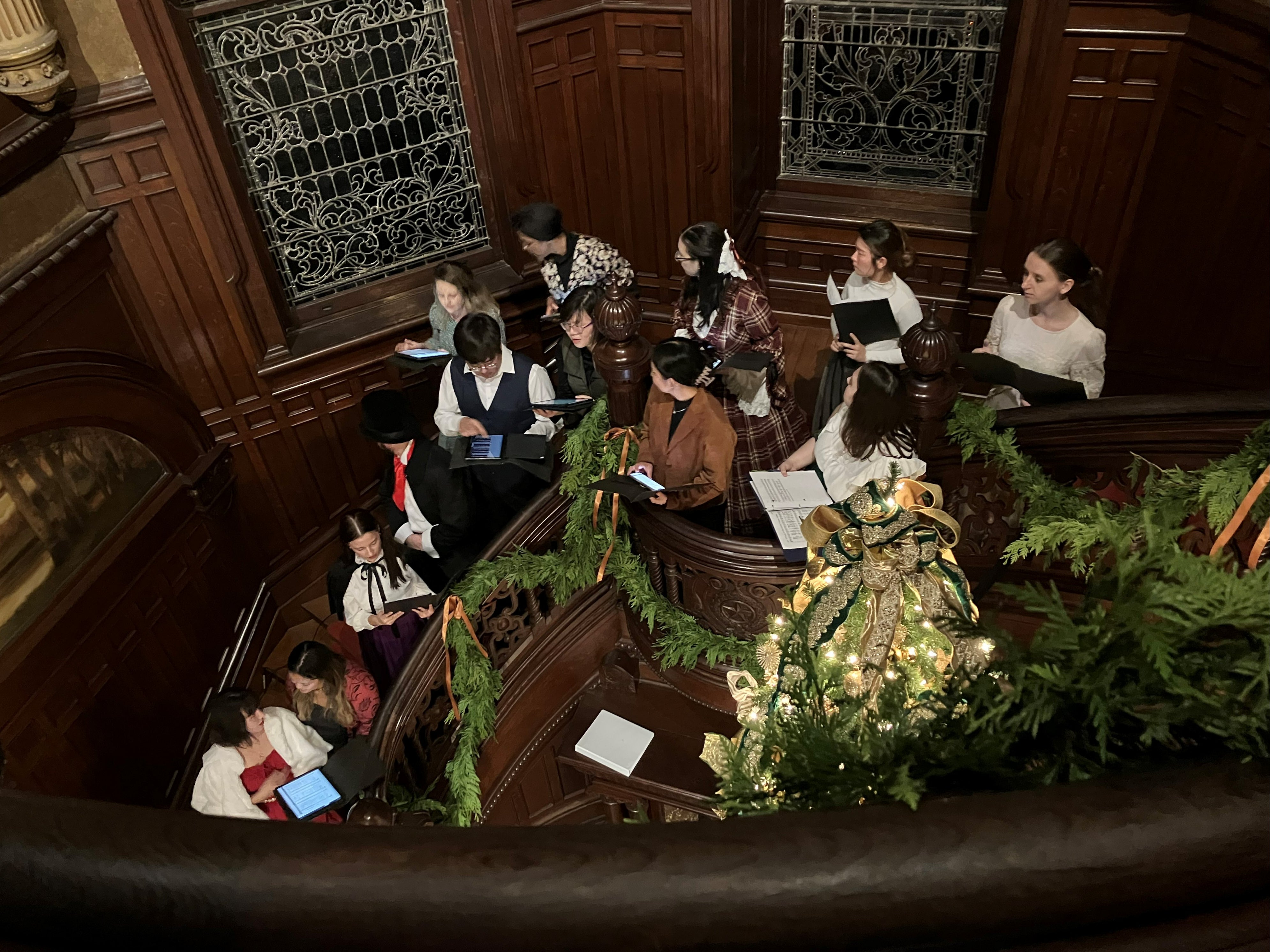 Singers performed carols inside the Bishop’s Palace