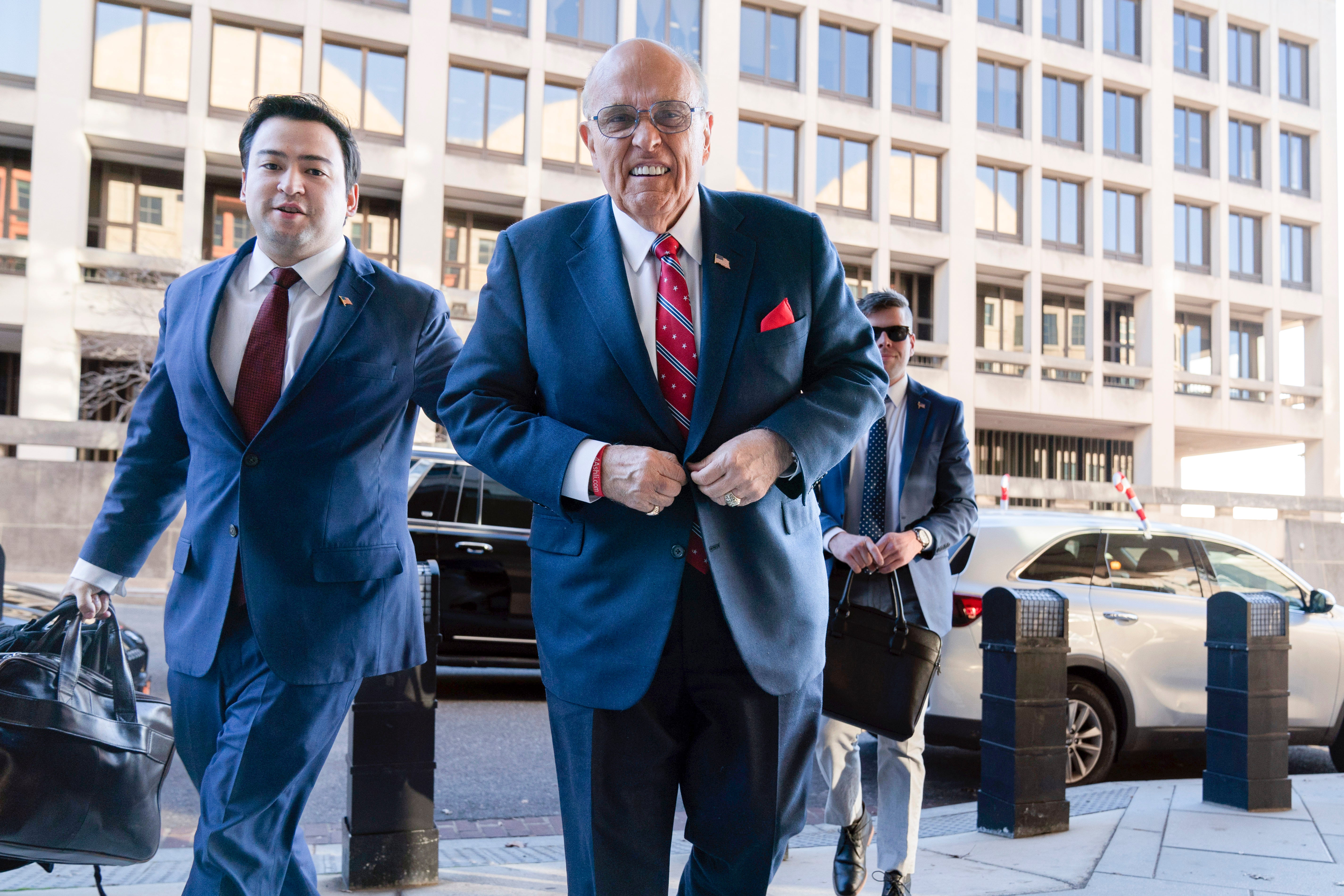 Rudy Giuliani arriving in court on 14 December