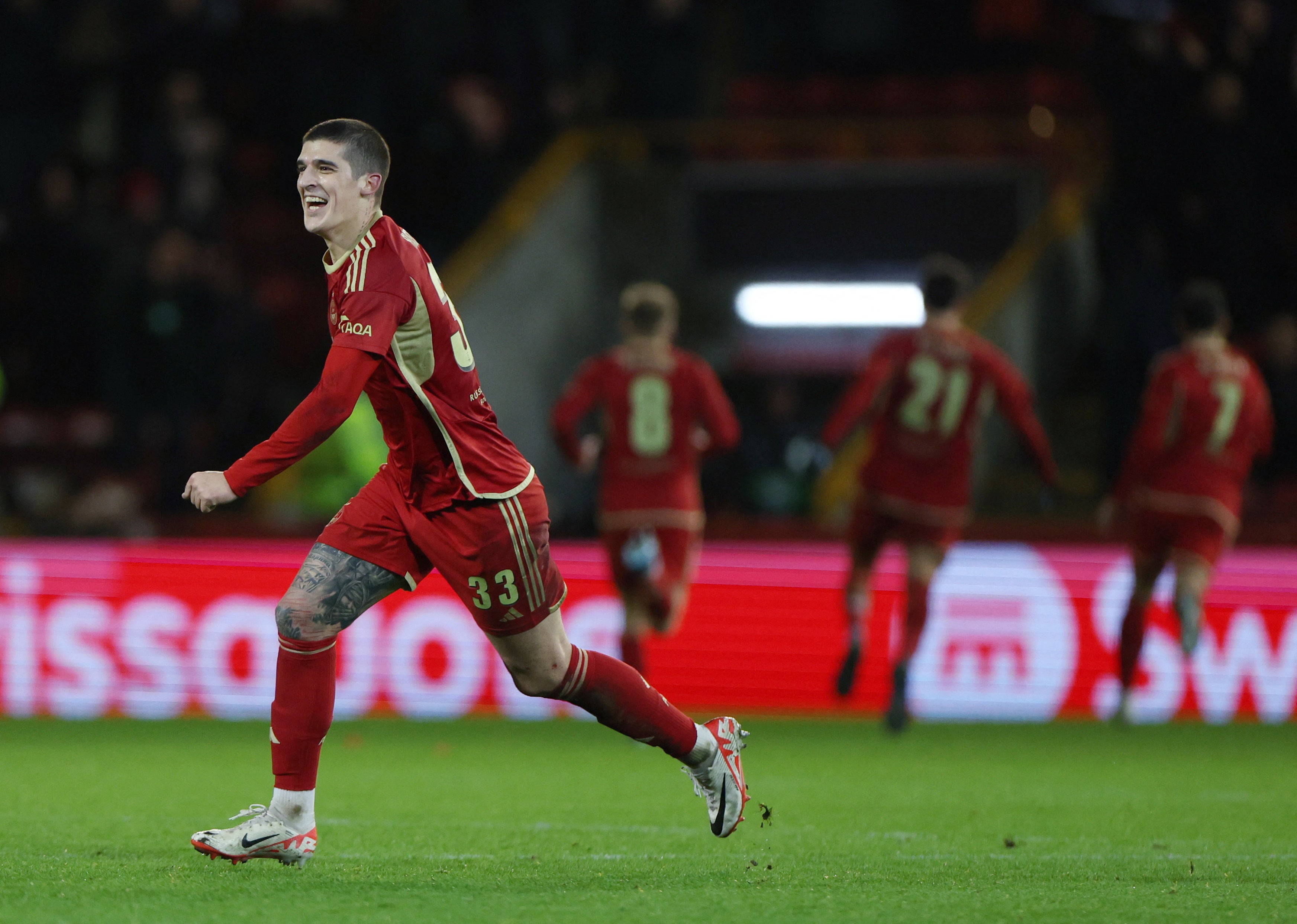 Aberdeen's Slobodan Rubezic celebrates their second goal scored by Ester Sokler