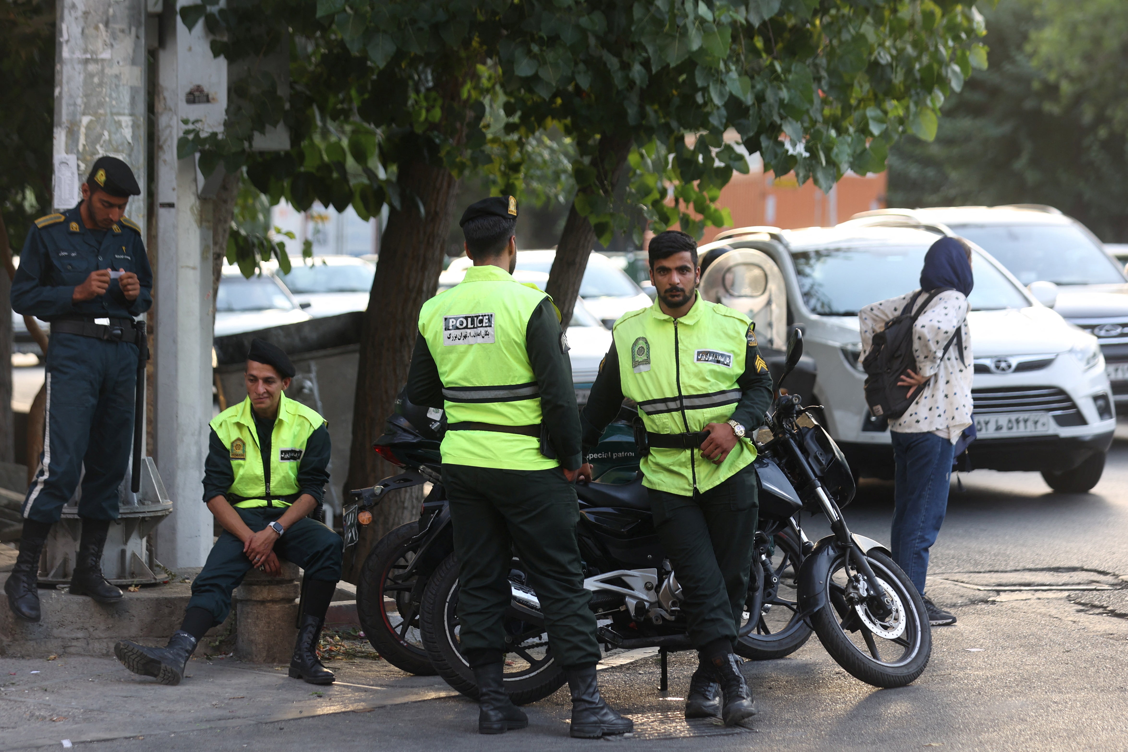 File: Iran’s police forces stand on a street during the revival of morality police in Tehran