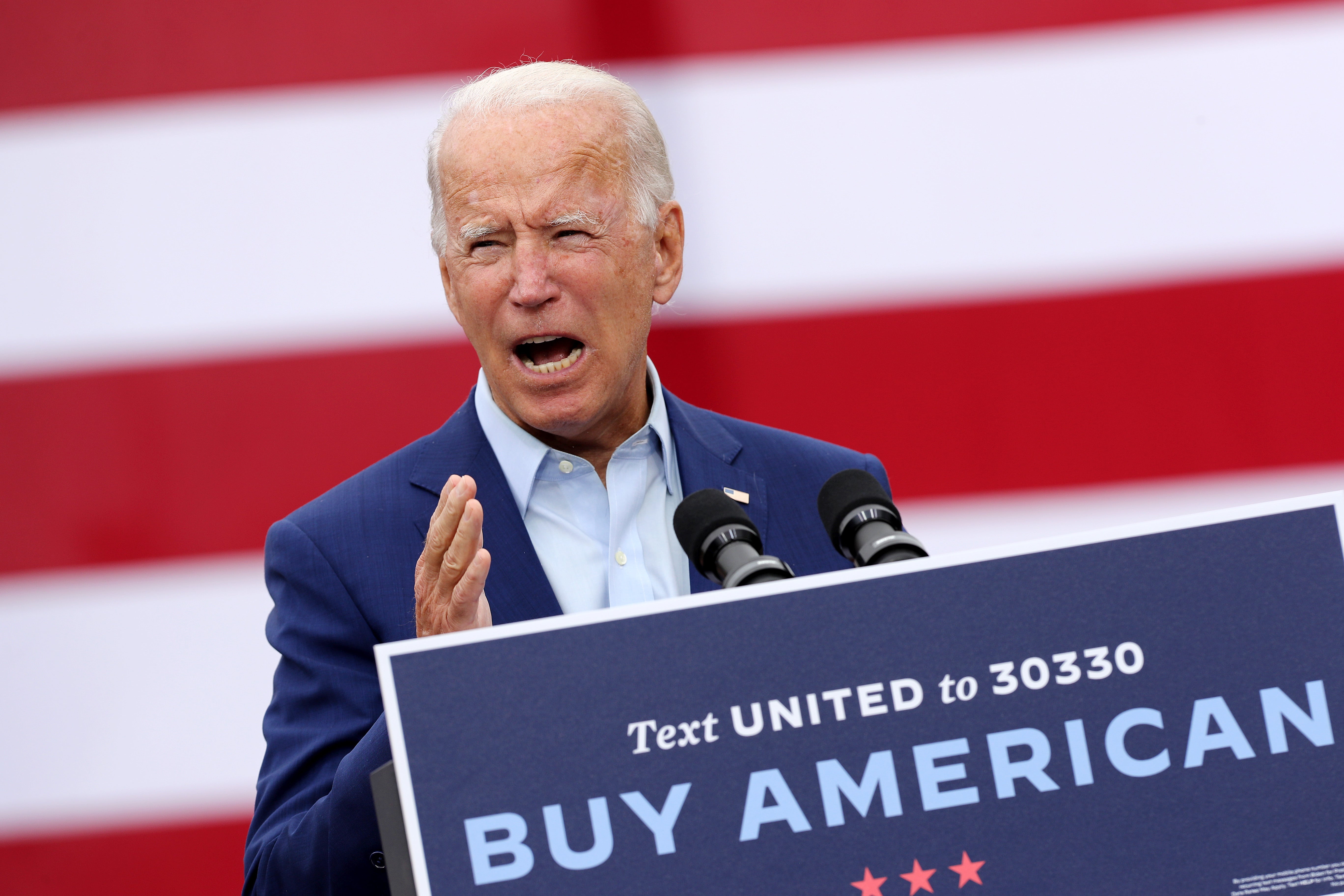 Joe Biden delivers remarks in the parking lot outside the United Auto Workers Region 1 offices on September 09, 2020 in Warren, Michigan