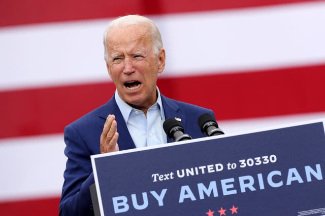 <p>Joe Biden delivers remarks in the parking lot outside the United Auto Workers Region 1 offices on September 09, 2020 in Warren, Michigan</p>