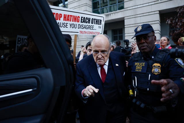 <p>Rudy Giuliani, the former personal lawyer for former US president Donald Trump, departs from the E Barrett Prettyman US District Courthouse after a verdict was reached in his defamation jury trial</p>