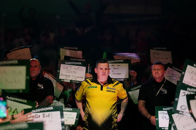 Dave Chisnall is through to the third round of the World Championship (Zac Goodwin/PA)