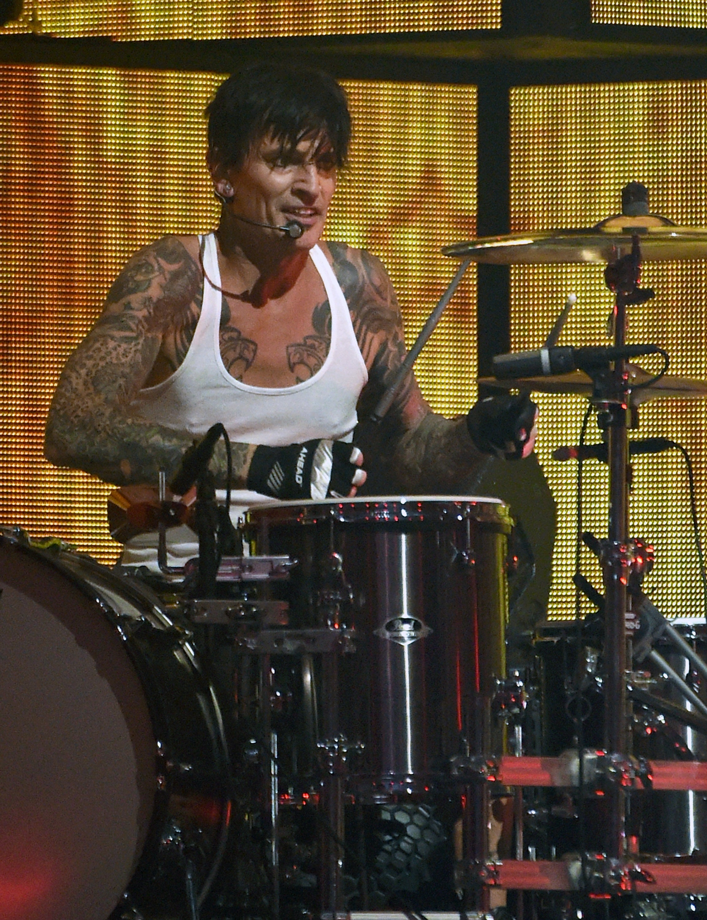 The Motley Crue drummer allegedly assaulted the unnamed woman during a trip in 2003