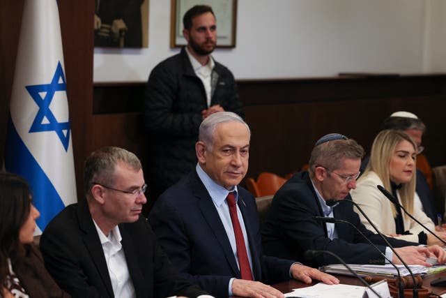 <p>Israeli prime minister Benjamin Netanyahu heads the weekly cabinet meeting at his office in Jerusalem</p>