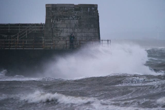 Heavy rain hitting the west of Scotland has led to transport disruption, with trains and ferry services affected (File image/PA)