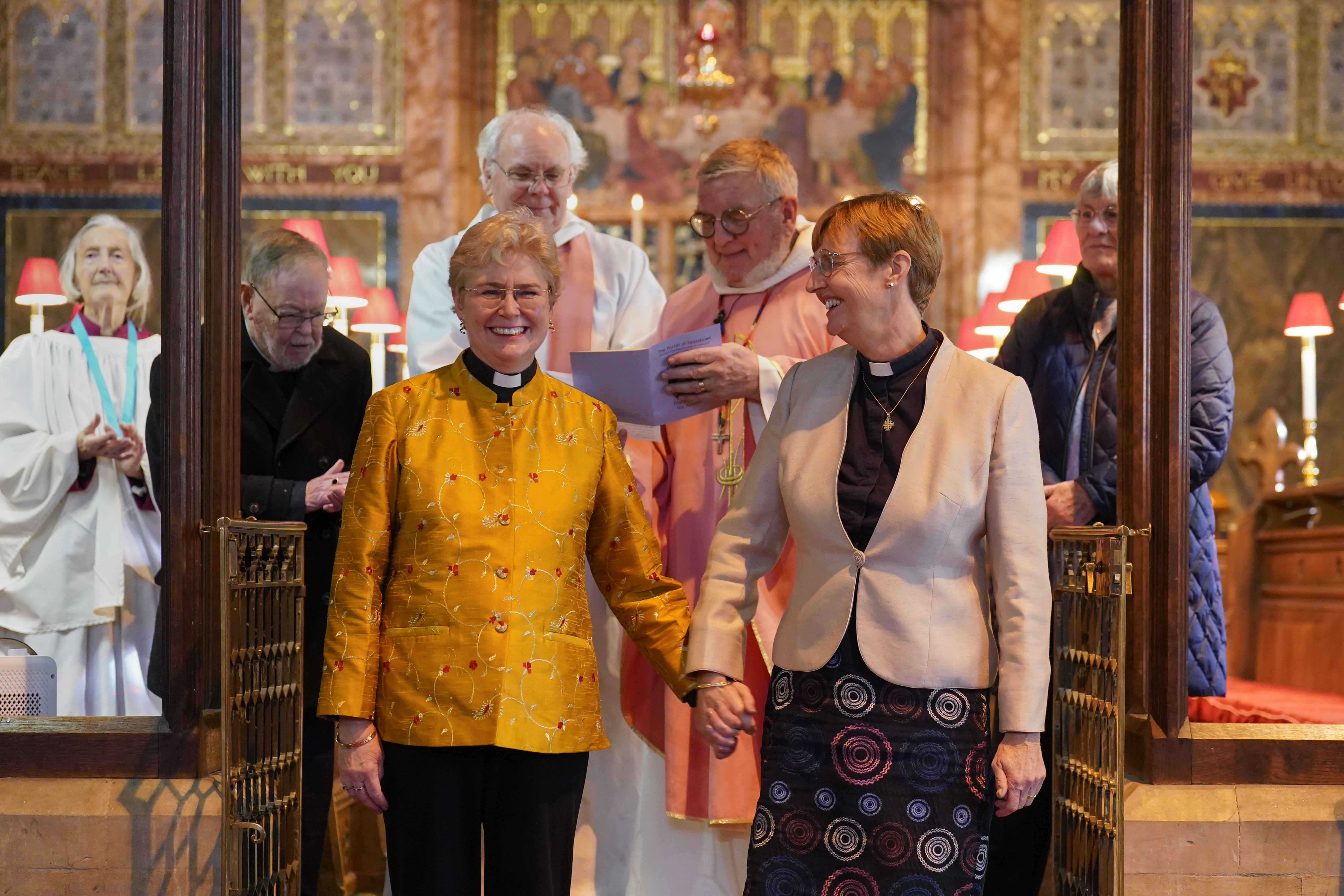 <p>Catherine Bond (left) and Jane Pearce after being blessed at St John the Baptist church in Felixstowe, Suffolk</p>