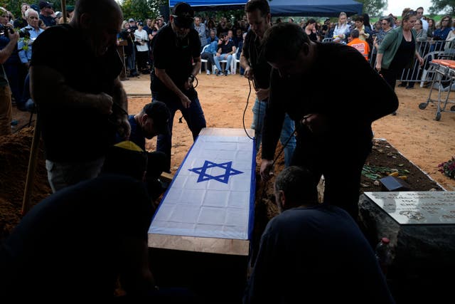 <p>The funeral of Alon Shamriz, one of three Israeli hostages killed by the IDF </p>