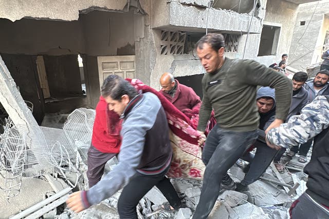 <p>Civil defense teams and local residents conduct a search and rescue operation in the rubble of the destroyed buildings in Jabalia  </p>