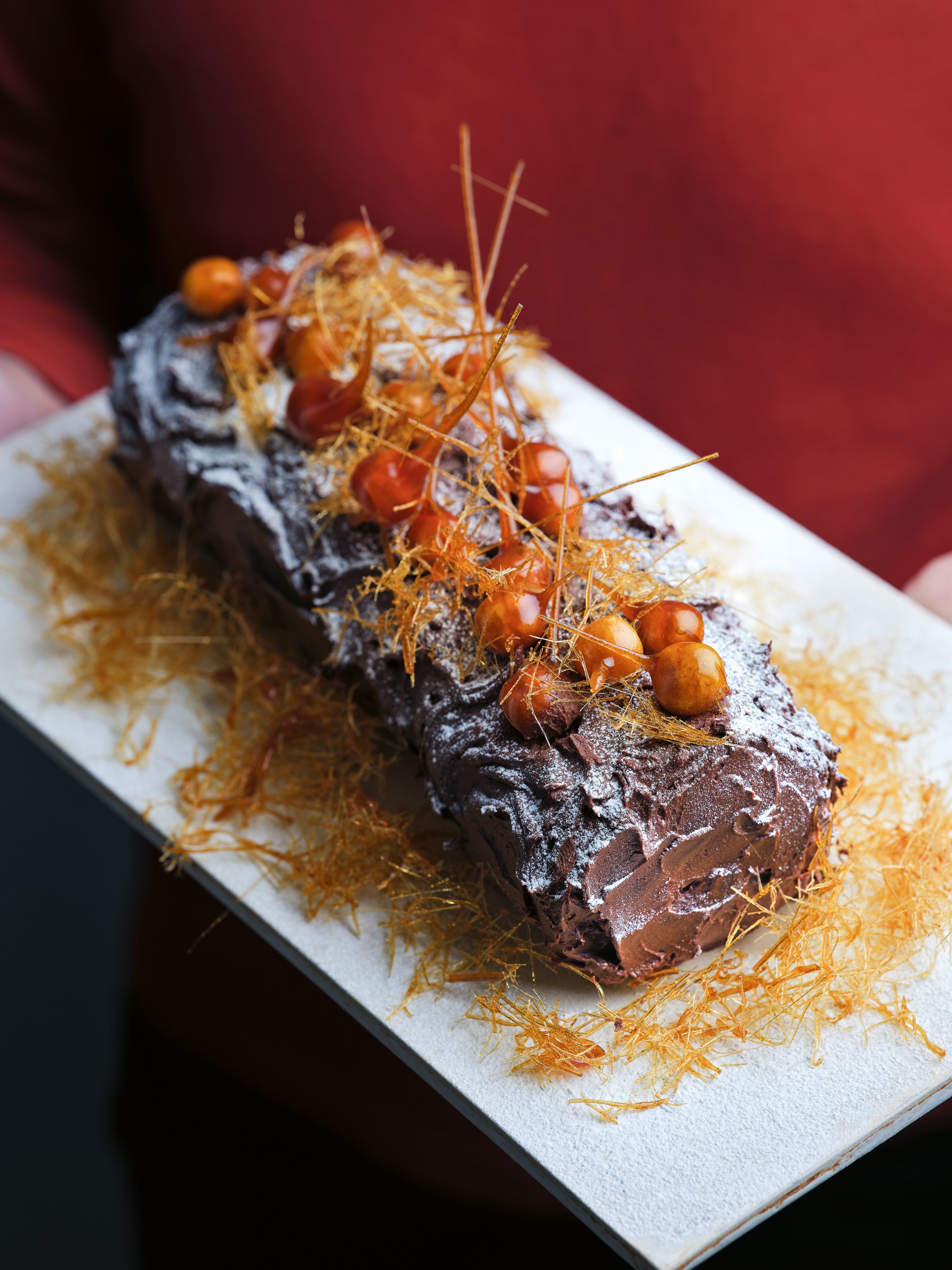 Michel Roux’s elegant roulade, where rich ganache meets the bright zing of orange liqueur