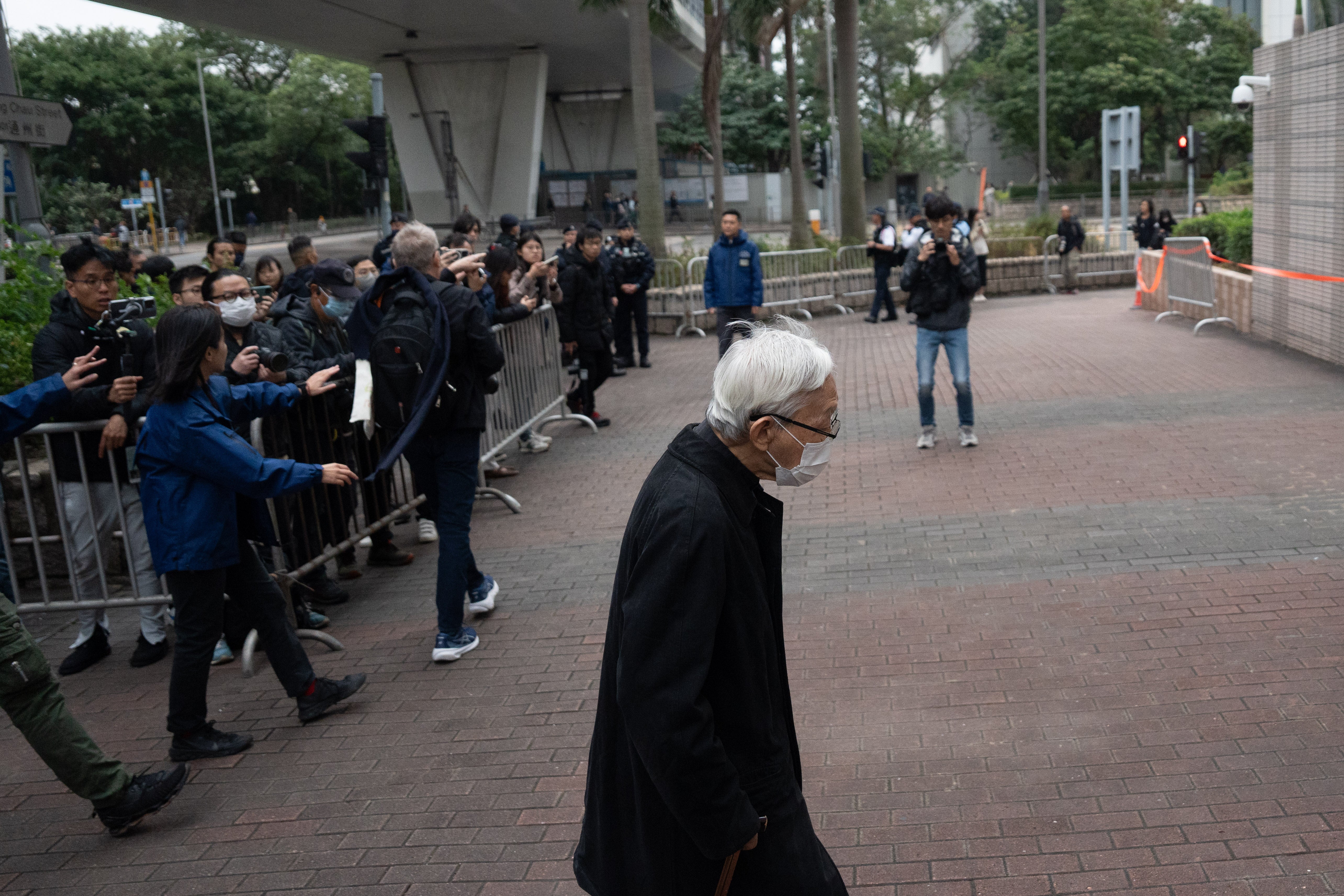 Cardinal Joseph Zen arrives at the West Kowloon Law Courts