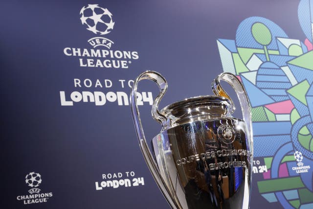 <p>The Uefa Champions League trophy at the last 16 draw in Nyon, Switzerland</p>