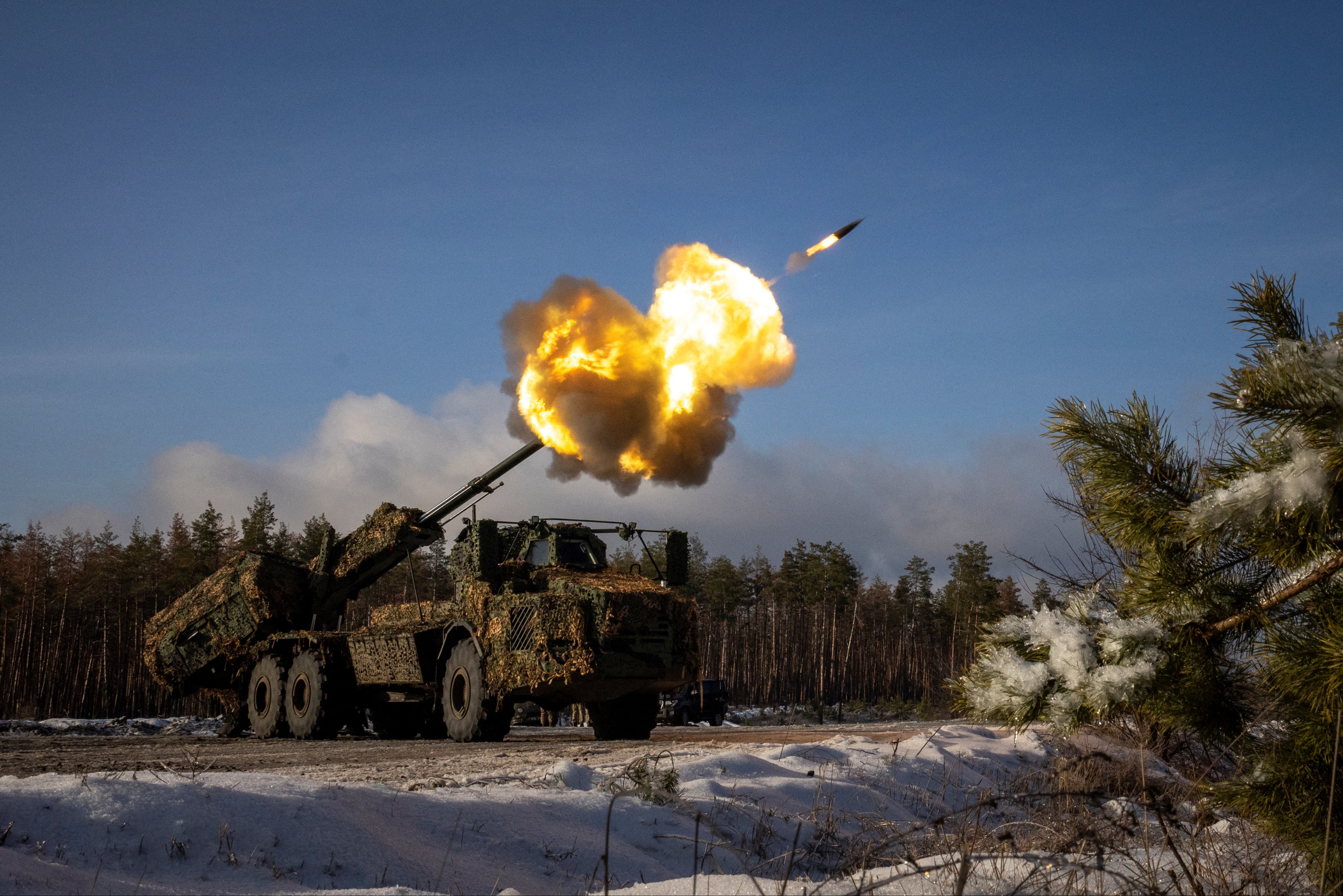 A Ukrainian artillery brigade fires at Russian positions in the Donetsk region