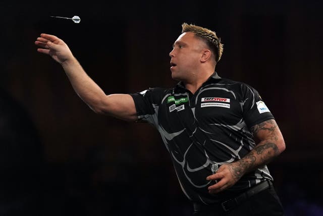 Gerwyn Price made a winning start to his 2023 world title bid (Adam Davy/PA)