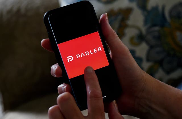 <p>This illustration picture shows social media application logo from Parler displayed on a smartphone in Arlington, Virginia on July 2, 2020.</p>