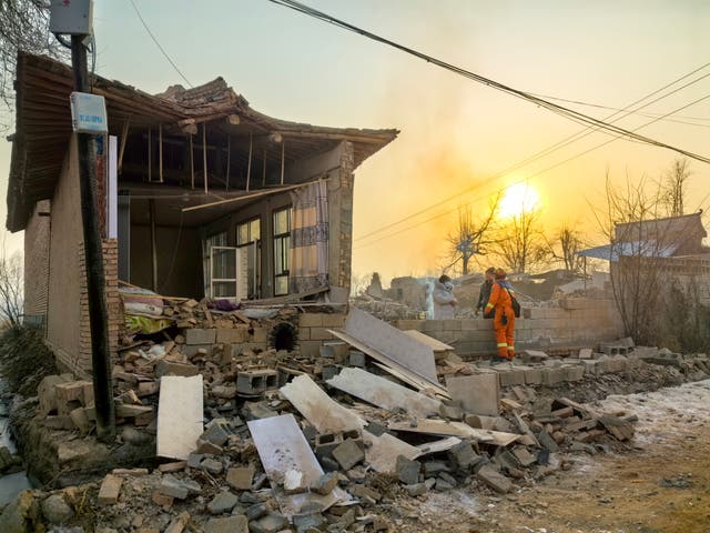 <p>Rescuers conduct search and rescue operations after a 6.2-magnitude earthquake on December 19, 2023</p>
