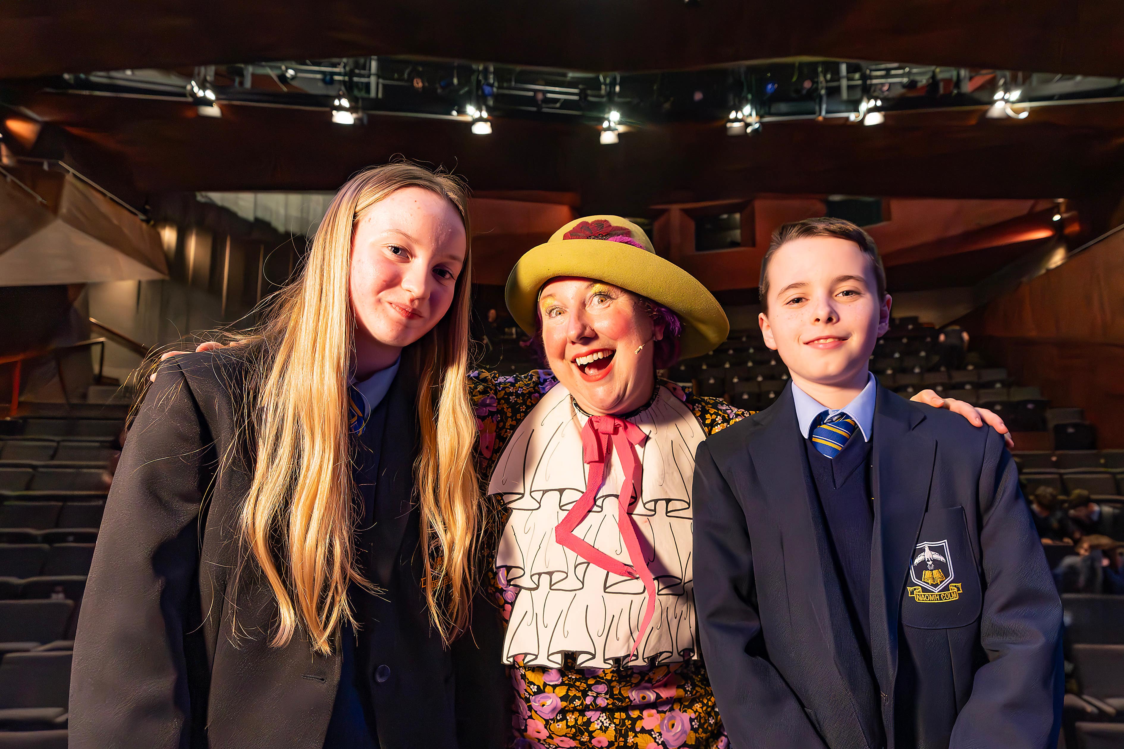 Aoife Shannon and Jay O’Halloran from St Colm’s High School with actress and dramatist Christina Nelson (Arts Council NI/PA)