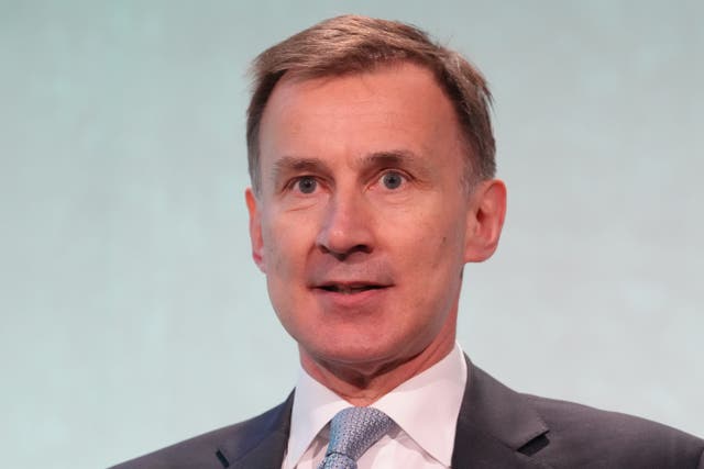 Chancellor Jeremy Hunt said Santa would have fewer toys to give out next year and debt interest to pay if he adopted Labour’s borrowing plans (Maja Smiejkowska/PA)