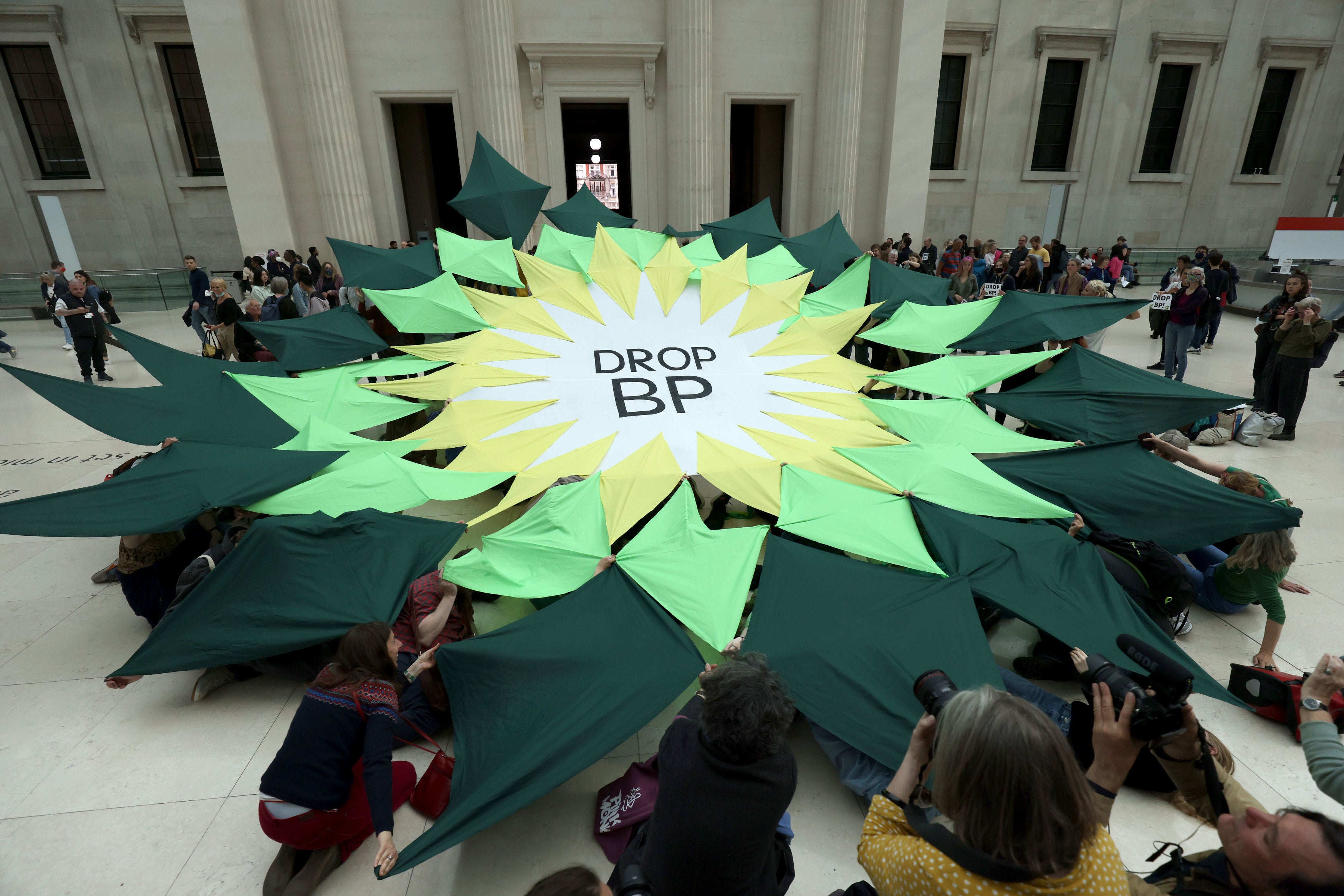 Extinction Rebellion protesters hold a ‘Drop BP’ sign inside the British Museum in April 2022