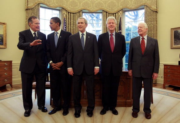 US president George W. Bush (C) meets with president-elect Barack Obama (2nd-L), former presidents Bill Clinton (2nd-R), Jimmy Carter (R) and George HW Bush (L) in the Oval Office on January 7 , 2009 in Washington, DC