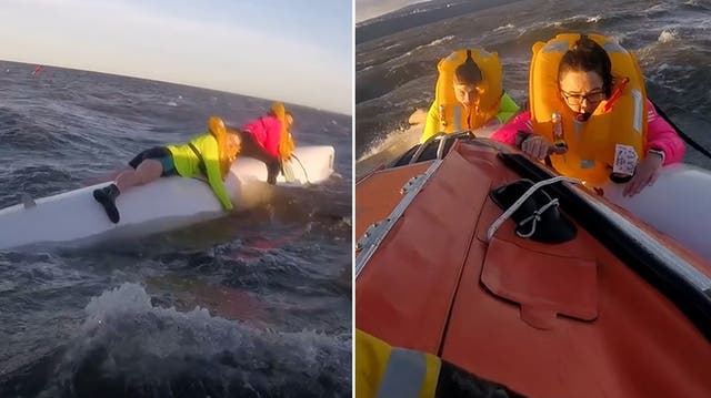 <p>Rowers cling to bottom of boat after it capsizes in North Sea.</p>