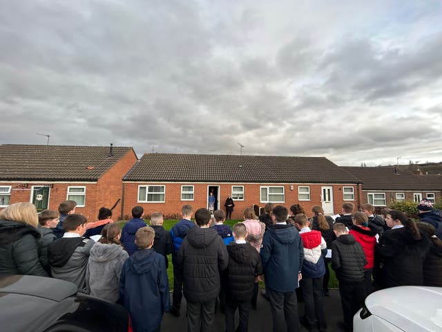 <p>Cath Whitehead was overwhelmed with emotion when her whole village showed up at her door to sing Christmas carols</p>