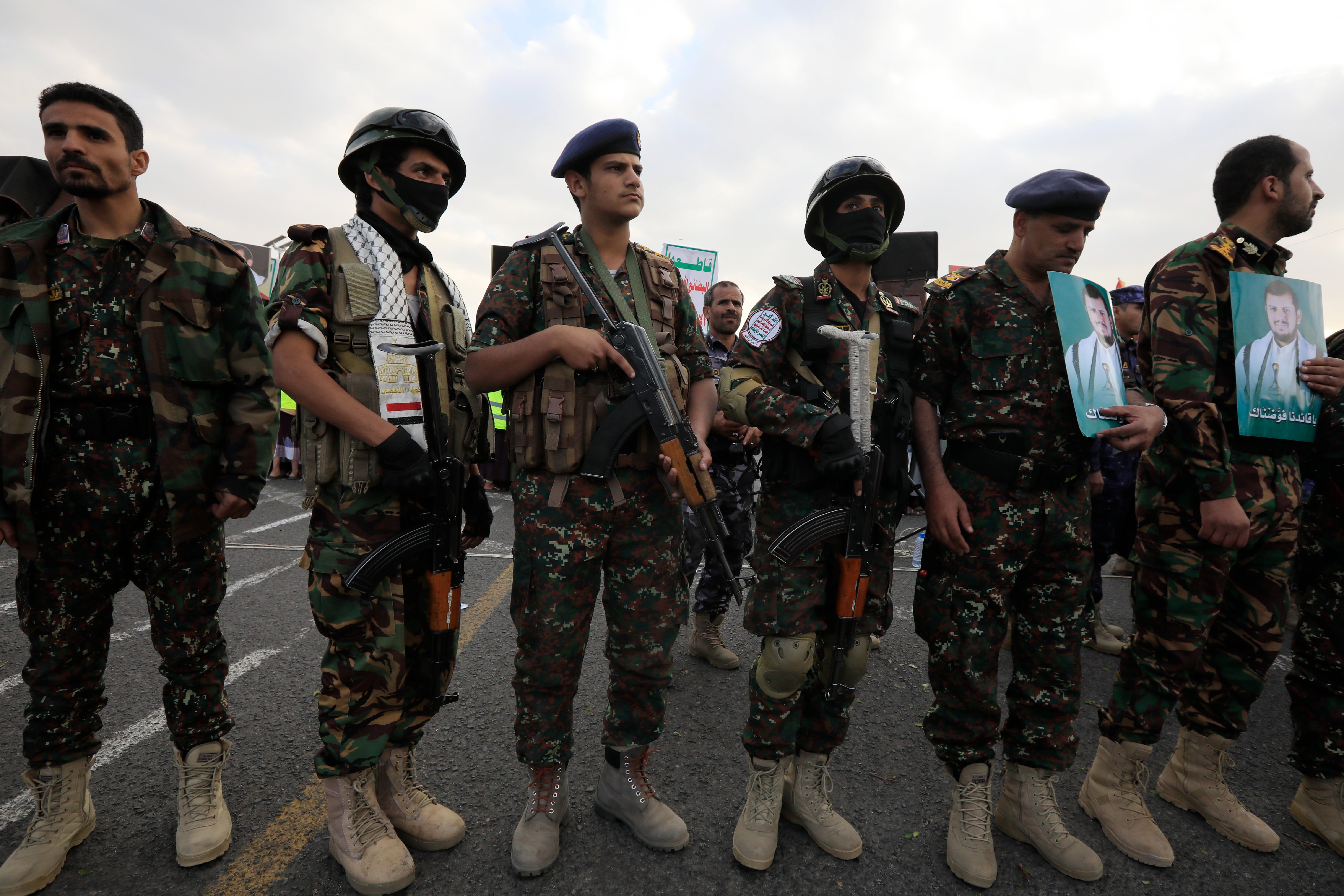 Houthi troopers take part in a protest in solidarity with the Palestinian people in the Yemeni capital of Sana’a