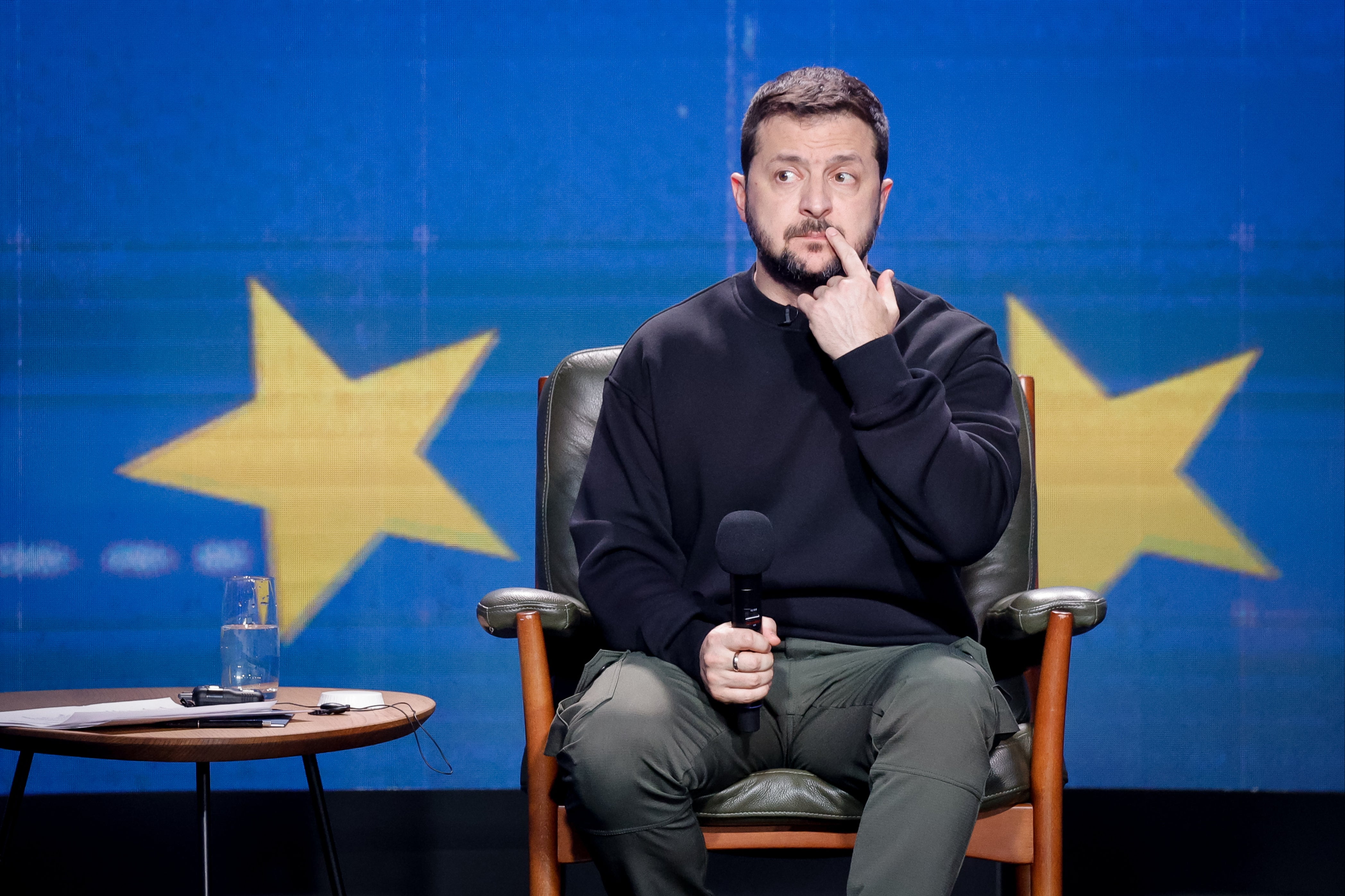 <p>Ukrainian President Volodymyr Zelensky listens to a question from a journalist during a press conference in Kyiv</p>