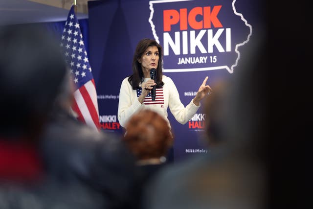 <p>Nikki Haley addresses guests during a campaign stop in Nevada, Iowa, on 18 December 2023</p>
