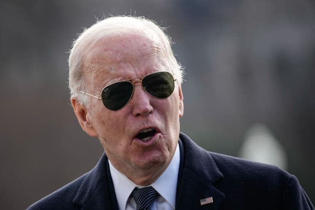 <p>Joe Biden speaks to reporters on the White House lawn</p>