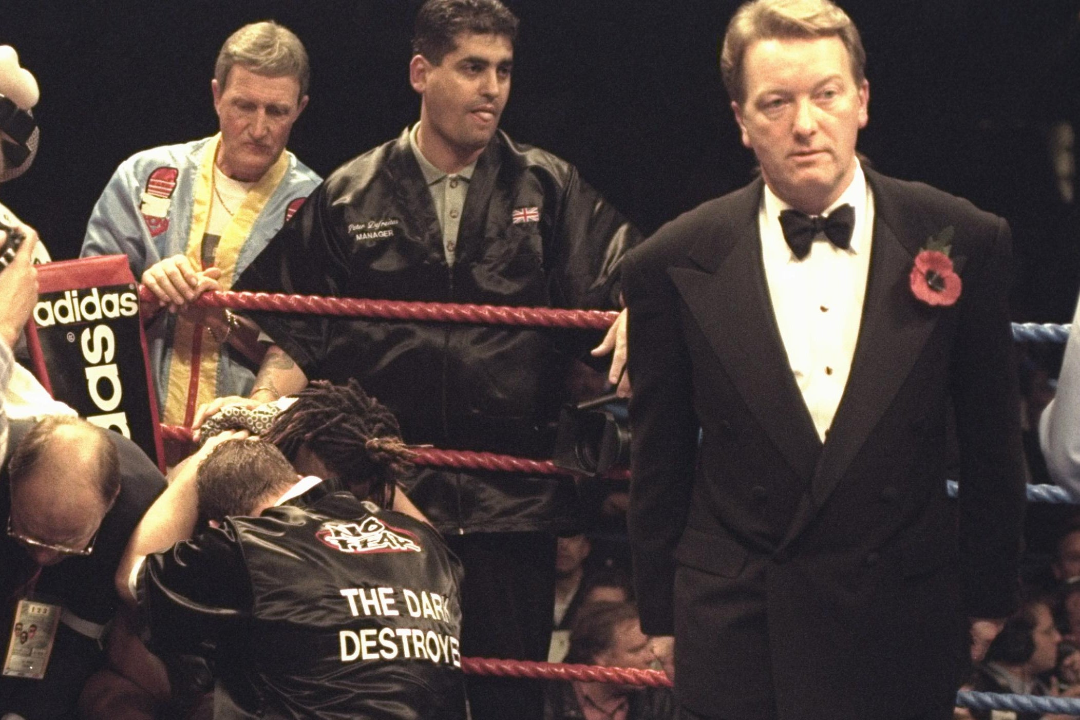 Warren in the corner of a beaten Nigel Benn in 1996