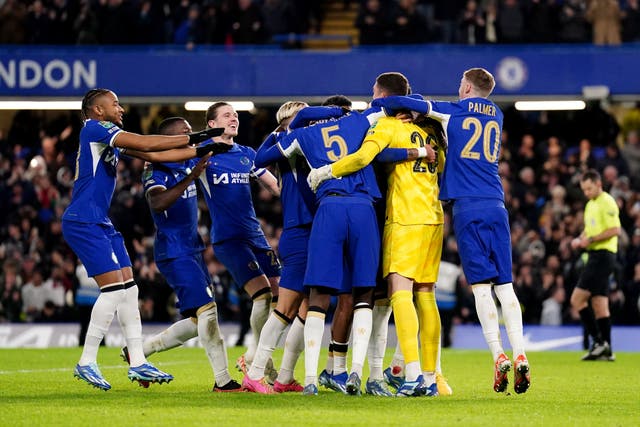 Chelsea celebrate their penalty shoot-out win over Newcastle (Zac Goodwin/PA)