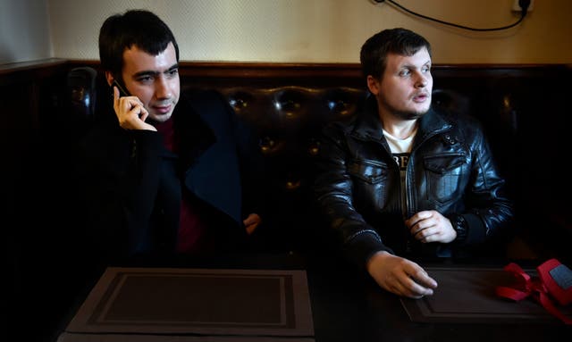 <p>Russian pranksters (L-R) Vladimir "Vovan" Kuznetsov, 30, and Alexei "Lexus" Stolyarov, 28, speak during an interview with AFP at a bar in Moscow</p>