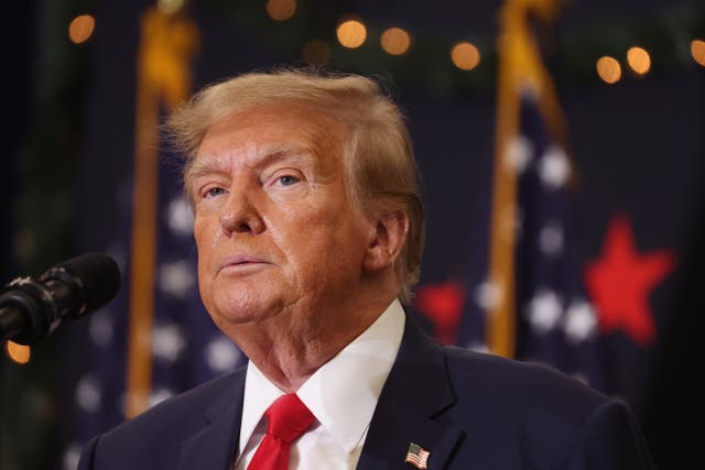 <p> Republican presidential candidate and former U.S. President Donald Trump looks on during a campaign event on December 19, 2023 in Waterloo, Iowa.</p>