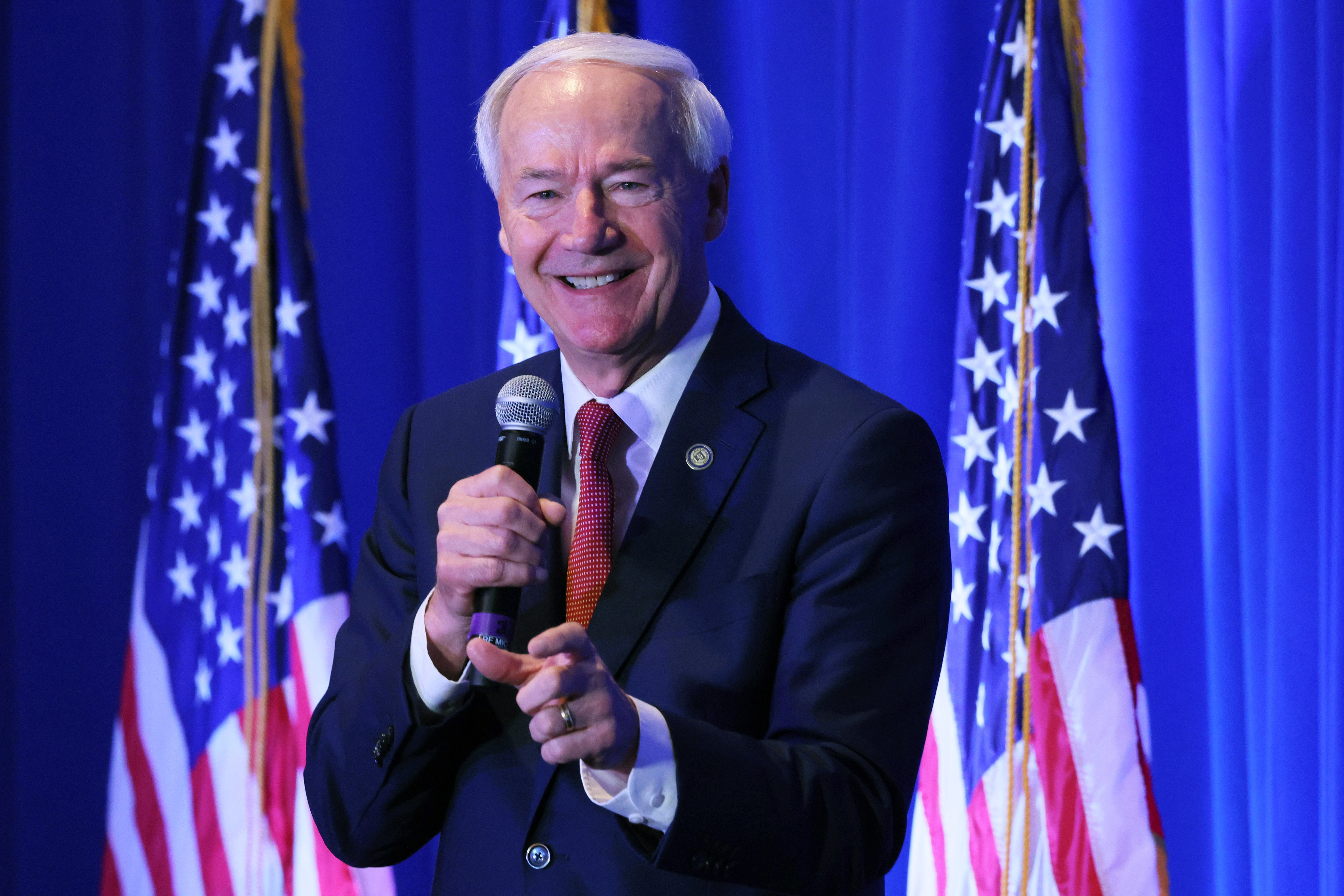 Republican presidential candidate former Arkansas Gov. Asa Hutchinson speaks during the 2023 First in the Nation Leadership Summit on October 14, 2023 in Nashua, New Hampshire.